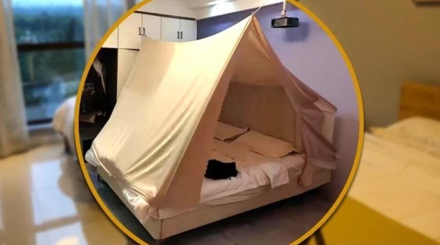 Gizli kameralardan korkan kızın otel odasında bulduğu çözüm herkesi şaşırtmaya yetti! "Yatağımda güvende olmak istedim"