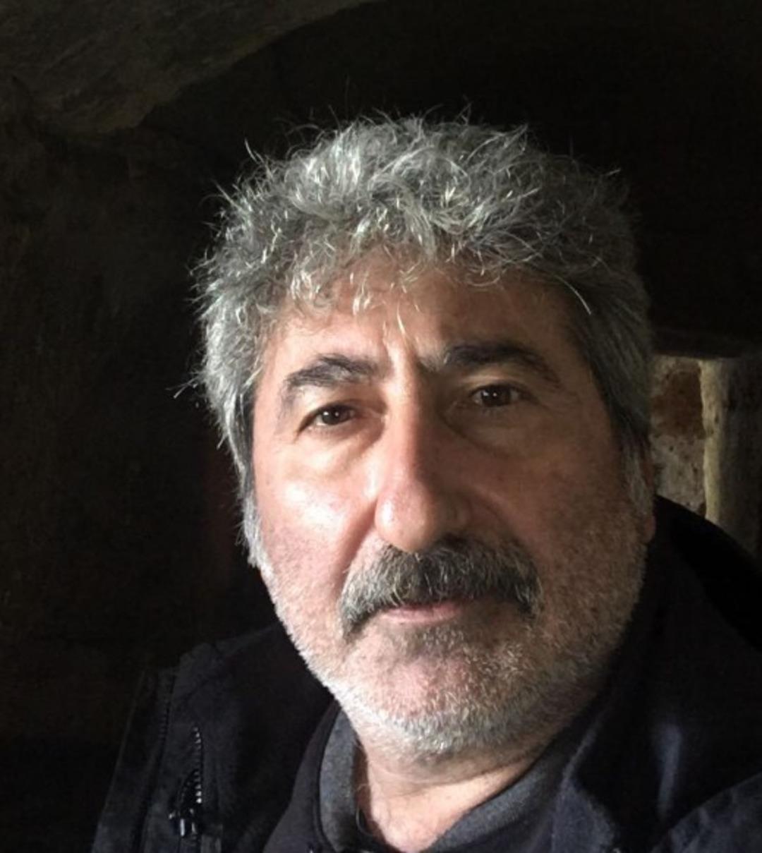 TUNA ORHAN