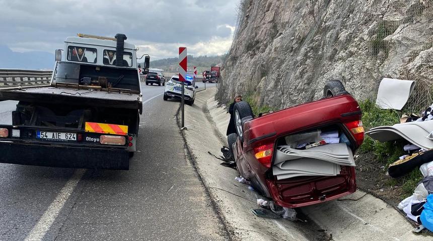 Takla atan otomobilden yara almadan kurtuldu