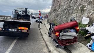 Takla atan otomobilden yara almadan kurtuldu