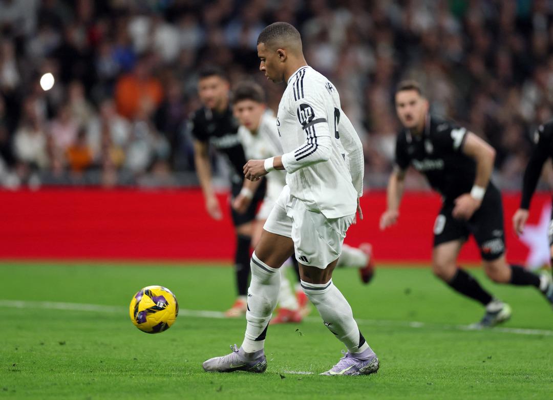 2025-03-29T203923Z_2053097464_UP1EL3T1LDLPI_RTRMADP_3_SOCCER-SPAIN-RMA-LEG-REPORT