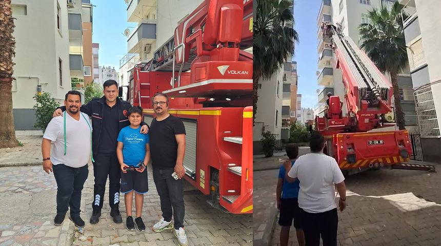 10 yaşındaki Tunahan'ın ağaca takılan helikopterini itfaiye kurtardı