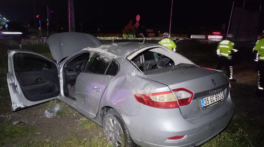 Manisa'da devrilen otomobilin sürücüsü ağır yaralandı