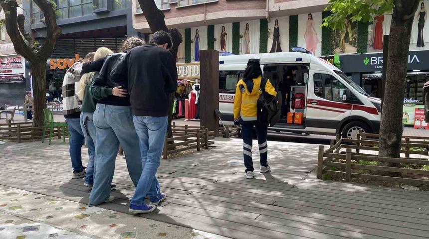 Mağazada yere düşen kadın yaralandı