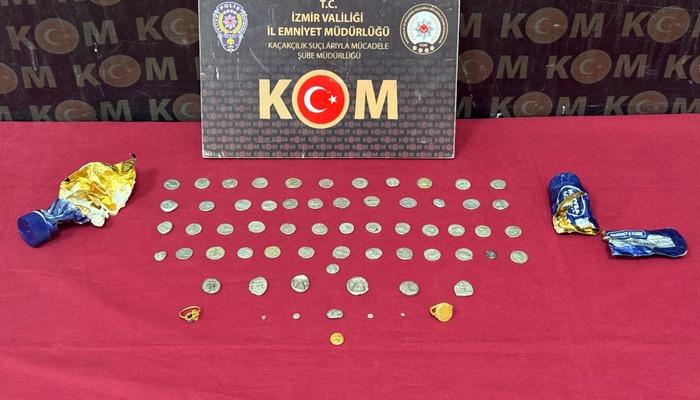 İzmir'de tarihi eserleri krem ve diş macunu tüplerinde yurt dışına çıkarmaya çalışan şüpheli tutuklandı