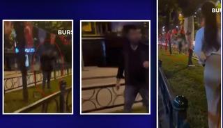 Kadın, Türk bayrağını yakmak isteyen adama engel oldu