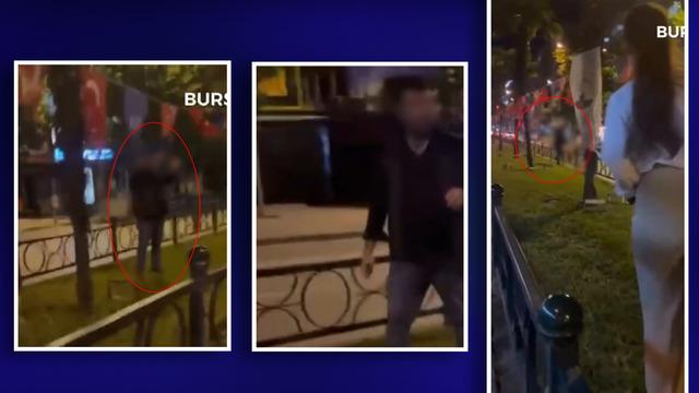 Bursa'da bir kadın, Türk bayrağını yakmak isteyen adama engel oldu! Elini çek, çıldırtma beni