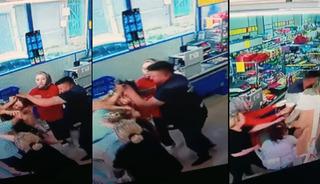 Markette dehşet: Kadının saçından tutup yere yatırdı, yumrukladı!