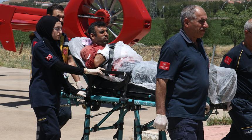 Çim biçme makinesine kolunu kaptırdı, ambulans helikopterle sevk edildi