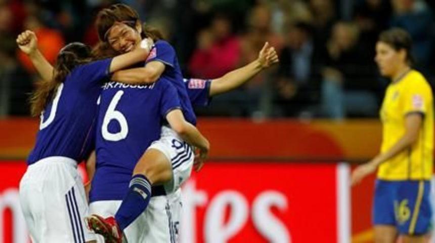 Japan saunter into final