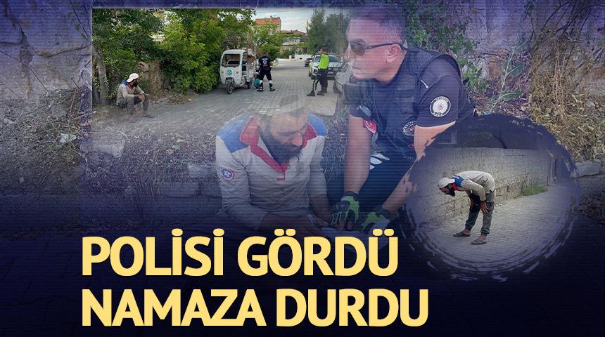 Polisi gördü, namaza durdu! 