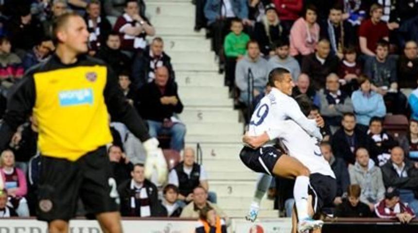 Tottenham thrash Hearts to take control