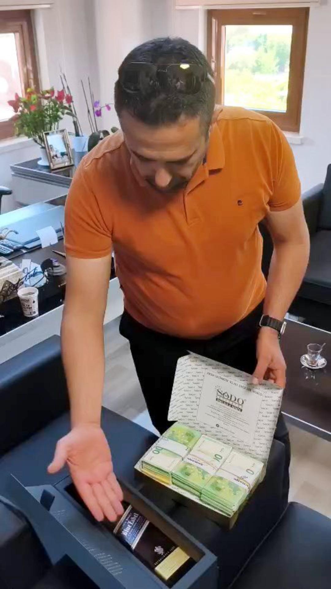 "Arkadaş yurt dışından viski ve çikolata getirdi" dedi içinden 110 bin euro çıktı! Mehmet Emin Tüter in rüşvet görüntüleri çok konuşuldu 2