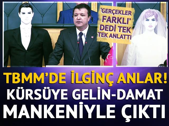 TBMM’de ilginç anlar! Fiyatların inanılmaz boyutlara ulaşmasına tepki gösterdi! Kürsüye gelin ve damat mankenleriyle çıktı… 
