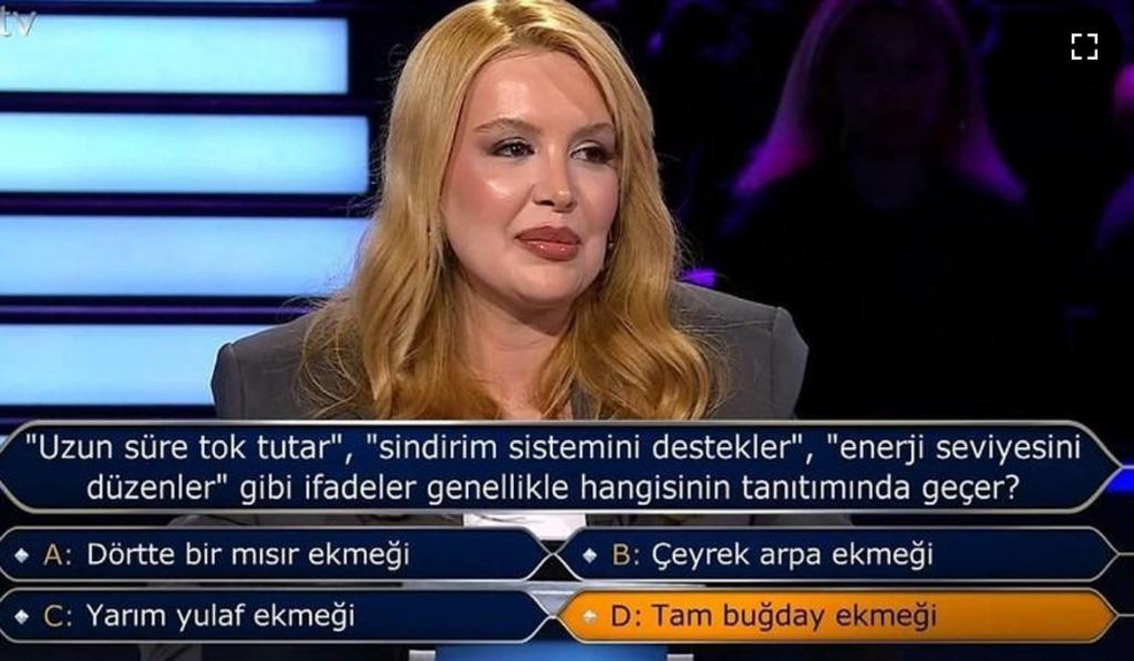 Ünlü futbolcunun eşi Kim Milyoner Olmak İster e katıldı! 2 bin TL lik ilk soruda joker kullandı 2