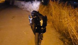 They dumped the stolen motorcycle in a vacant lot and fled.