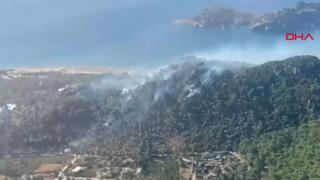 Sarıgerme'deki orman yangını kontrol altında: Tarım arazisinden sıçrayan alevler korkuttu