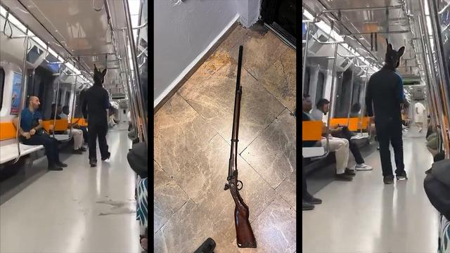 Elinde tüfek kafasında tavşan kostümü...