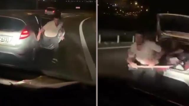 Trafikte baltalı saldırı! Önce önünü kesti, sonra bagajdan balta çıkarıp saldırdı aracın camlarını kırdı... O anlar kamerada