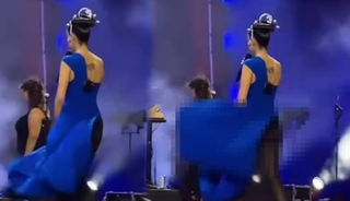 Melike Şahin rüzgarın azizliğine uğradı! Eteği bir anda açıldı