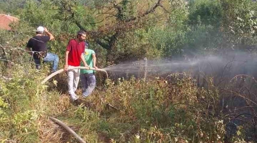 Otluk alanda çıkan yangın evlere ve ormanlık alana sıçramadan söndürüldü