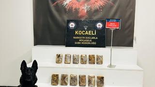 Kocaeli'de yolcu otobüsünde 6 kilo 765 gram eroin yakalanmasına ilişkin 2 şüpheli tutuklandı