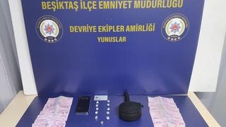 Beşiktaş'ta aracının gizli bölmesinde uyuşturucu ve şarjör bulunan zanlı tutuklandı