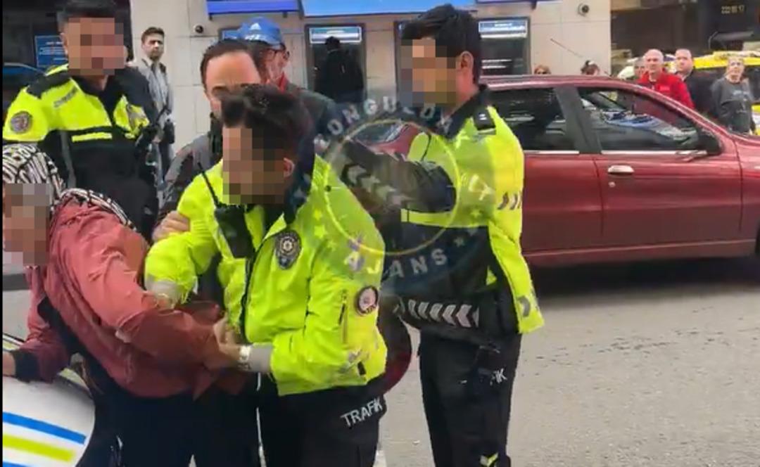 Eşine ceza yazılmaması için kaskla polise vurmaya çalıştı! EGM den açıklama geldi 2