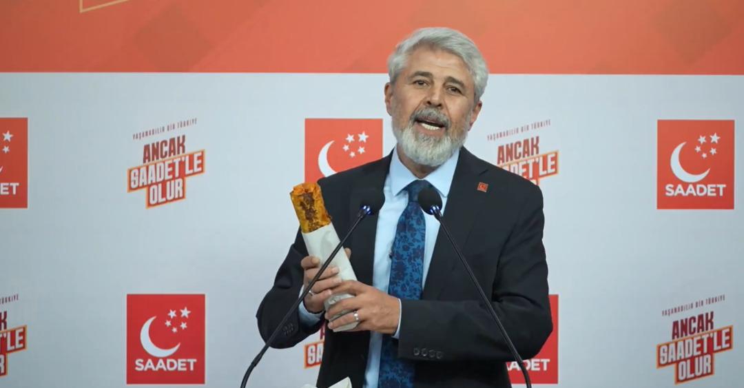 Kürsüye elinde tavuk dürümle çıktı! Enflasyon verilerinden sonra  dürümflasyon  hesabı gündem oldu: "Tam 66 adet eksilmiş" 1