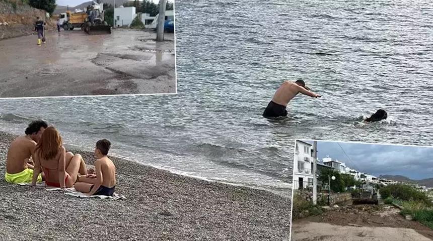 Bodrum'da sağanağa rağmen turistler denize girdi