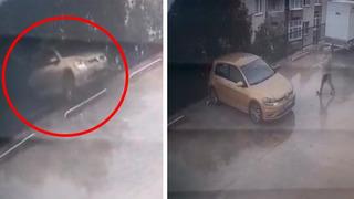 Otomobilini yanlışlıkla geri vitese alınca, 7 metre yükseklikten düştü; kaza anı kamerada