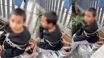 Eşofman çalan çocuğu herkesin ortasında iple bağladı: 'Seni anadan doğma edeceğim'