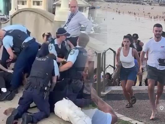 &Uuml;nl&uuml; plaja ter&ouml;r saldırısı: Sidneylilerin panik anı kamerada