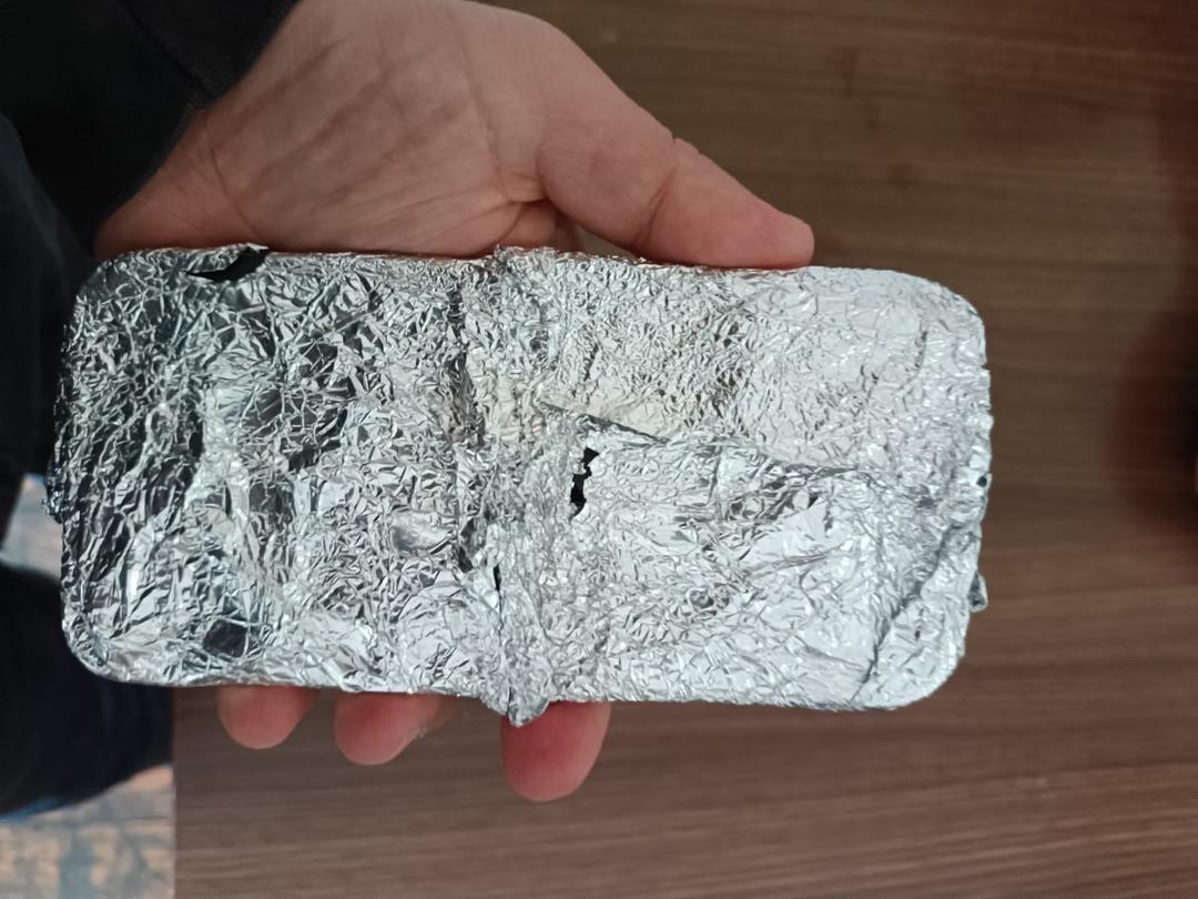 Çaldıkları telefona alüminyum oyunu ! Polisi bile şaşırtan düzenek 6