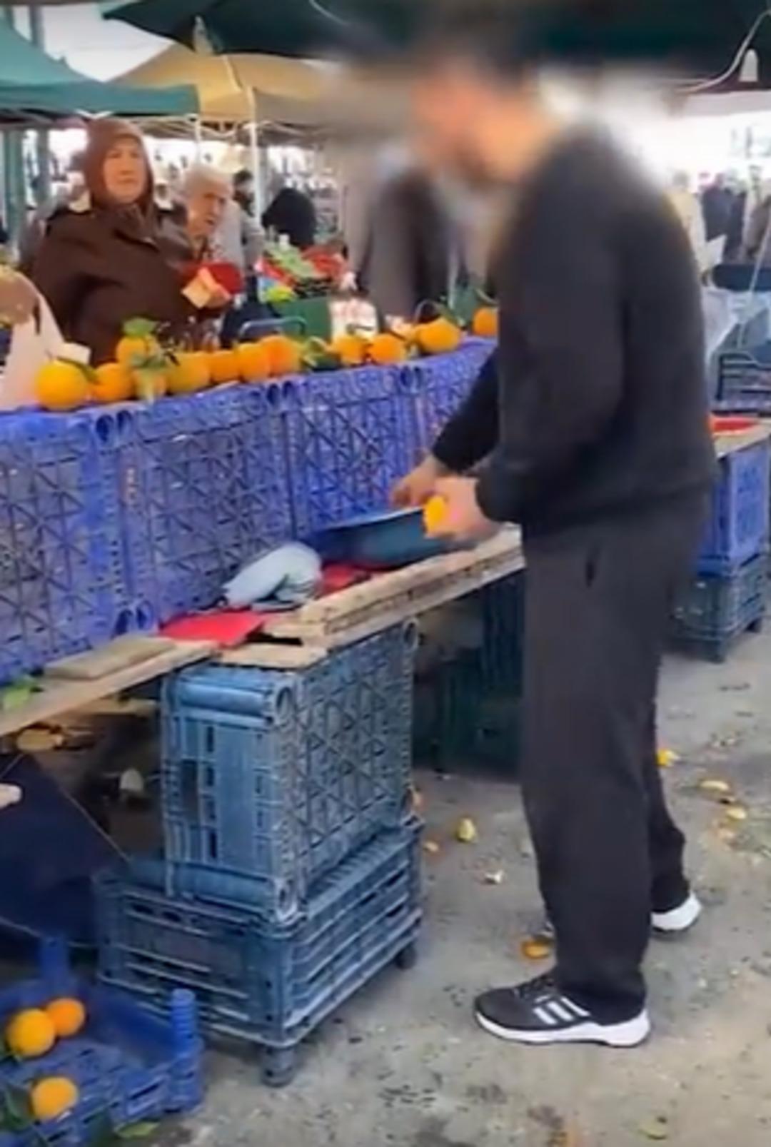 Skandal g&ouml;r&uuml;nt&uuml;! Portakal satmak i&ccedil;in pazarcının bulduğu hile şaşkına &ccedil;evirdi 1