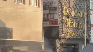 Yeni aldığı otomobilinden alevler yükseldi, yangını söndürdü