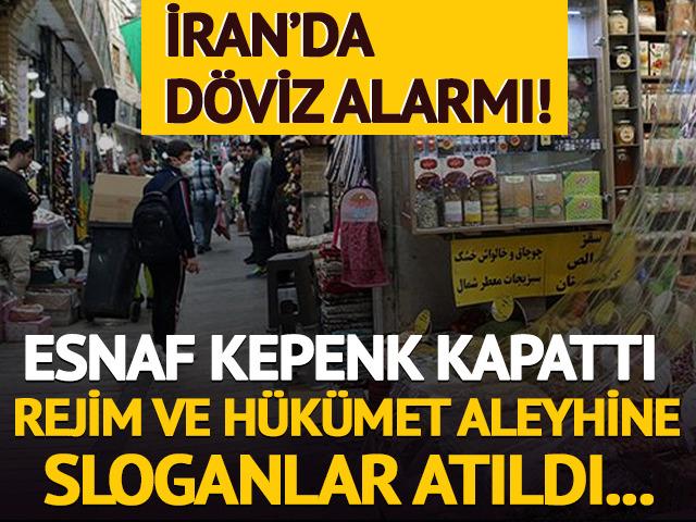 İran'da d&ouml;viz alarmı! Esnaf kepenk kapattı, h&uuml;k&uuml;met aleyhine sloganlar atıldı