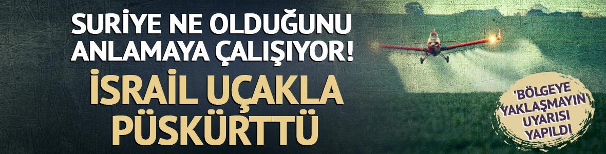 İsrail u&ccedil;akları Suriye'deki arazilere bilinmeyen sıvı p&uuml;sk&uuml;rtt&uuml;