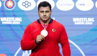 610 g&uuml;n sonra d&ouml;nd&uuml; altın madalya aldı! 