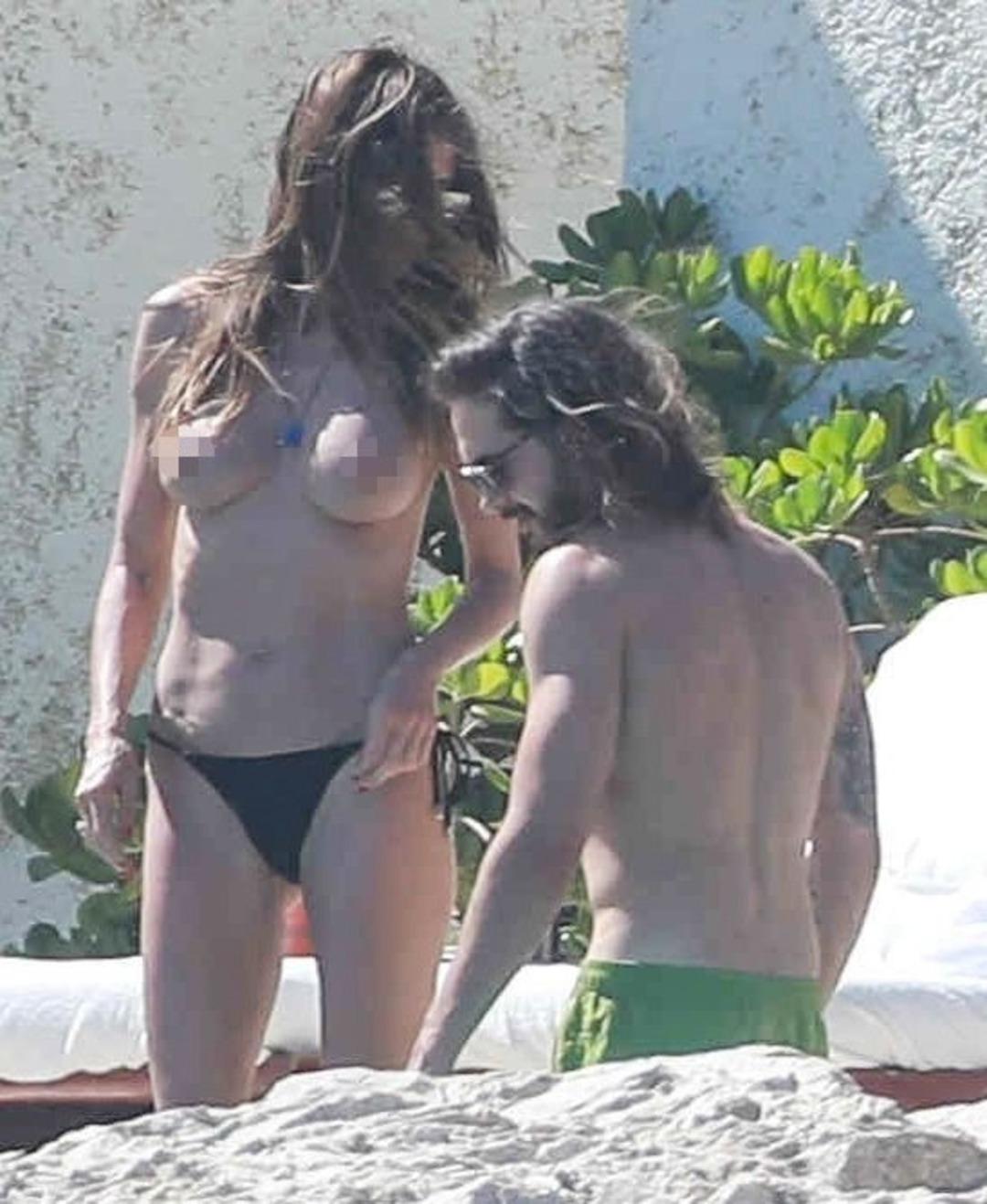 Heidi Klum &uuml;sts&uuml;z yakalandı! Sıcak saatler