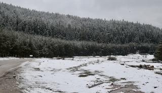 Bolu ve Karab&uuml;k'&uuml;n y&uuml;ksek kesimlerine ilkbaharın ortasında kar yağdı