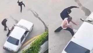 Taşlarla ara&ccedil;lara saldırdılar: Kavga anları kamerada