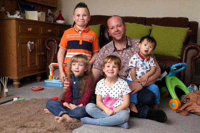 Gay-single-realizes-dream-of-being-a-father-and-adopts-4-children-with-disabilities-5acfc371564a5__700