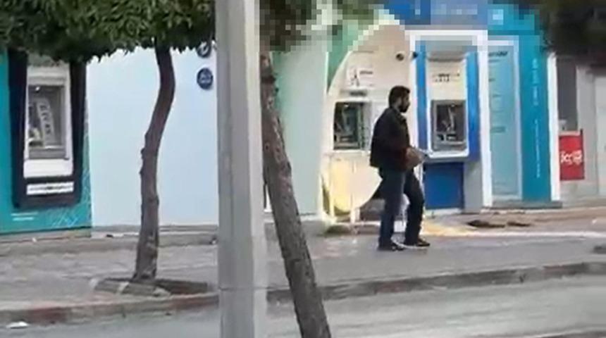 Adana'da ATM'ye taşlı saldırı! Saldırgan yakalandı