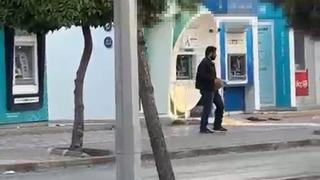 Adana'da ATM'ye taşlı saldırı! Saldırgan yakalandı