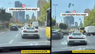 G&ouml;r&uuml;nt&uuml;ler İstanbul'dan! L&uuml;ks aracından tomar tomar euro sa&ccedil;tı