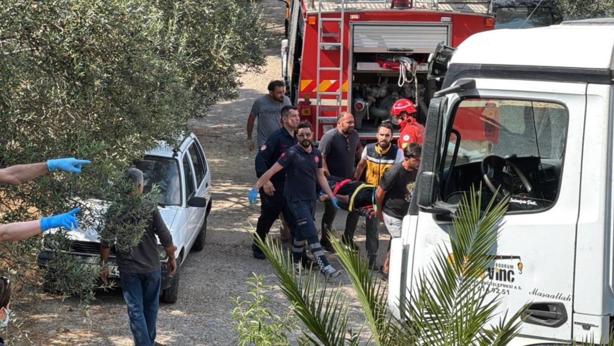 Bodrum da devrilen kamyonda sıkışan 3 kişi kurtarıldı 1
