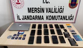 Mersin'de sahte ilanlarla dolandırıcılık yaptıkları iddia edilen 18 ş&uuml;pheli tutuklandı