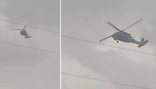 Askeri helikopter dolu ve yağmura yakalandı