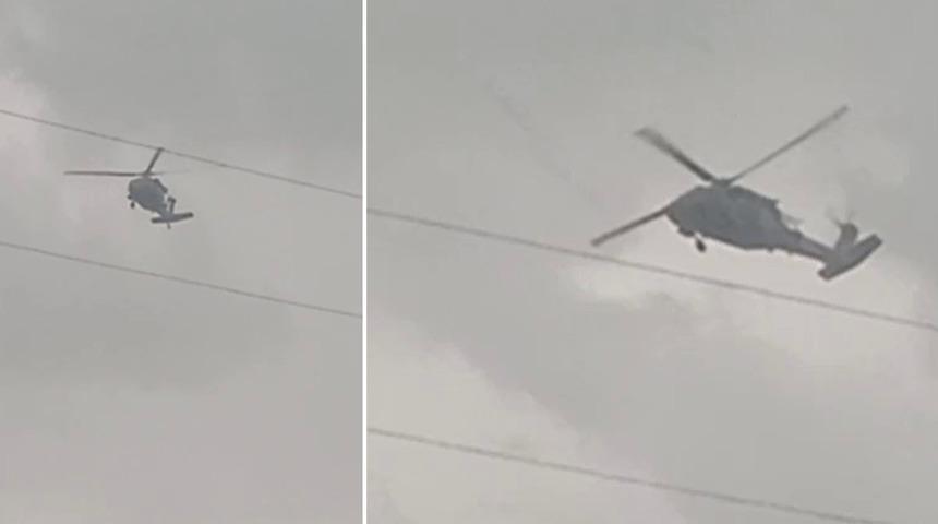 Askeri helikopter dolu ve yağmura yakalandı